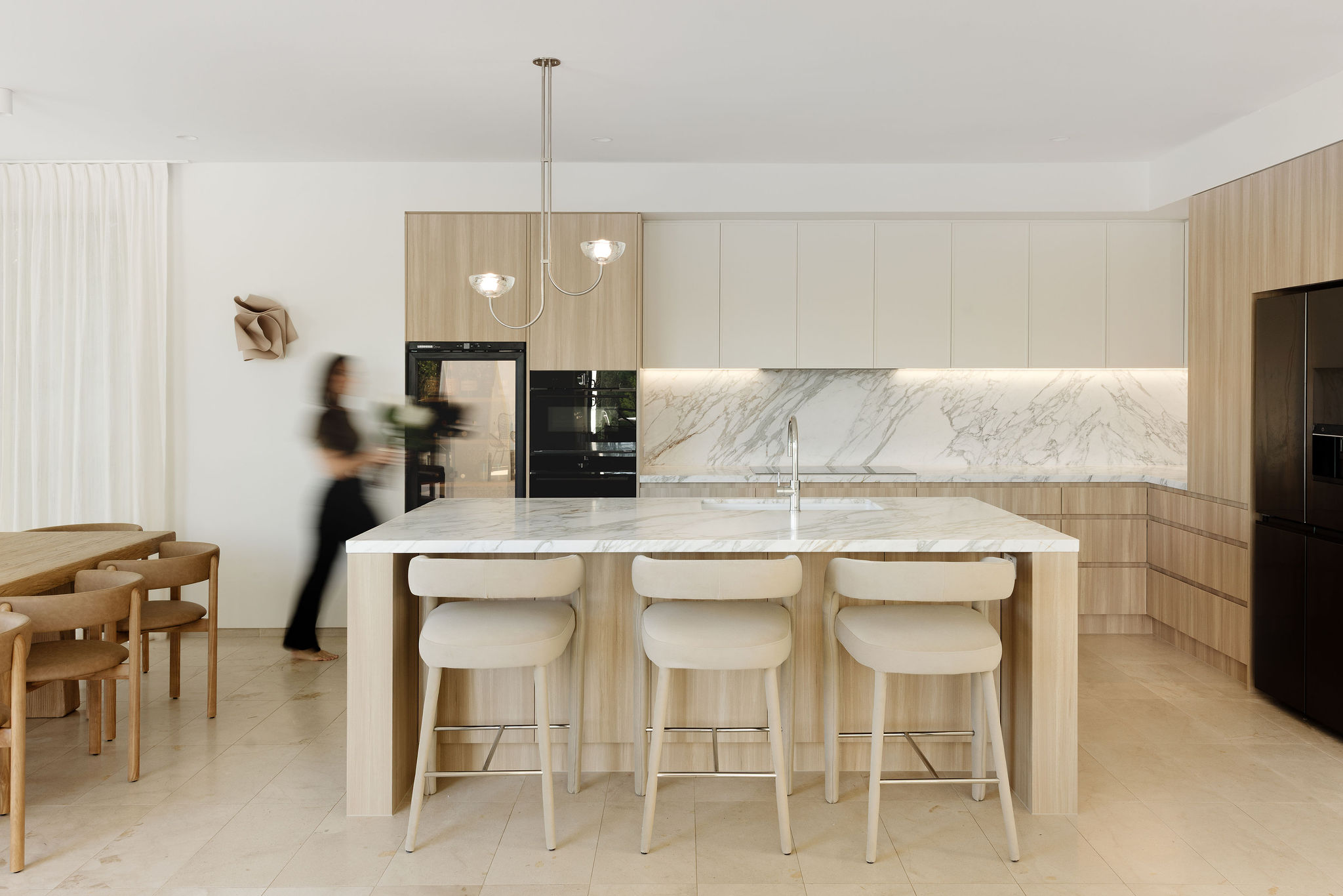 Renovated coastal kitchen, kitchen, laundry and powder room renovation on Orient Drive, Sunrise Beach by Pearl Interiors, built with Nomad Builders, Franca Designs stone benchtops and Faucet Strommen tapware, Sunshine Coast