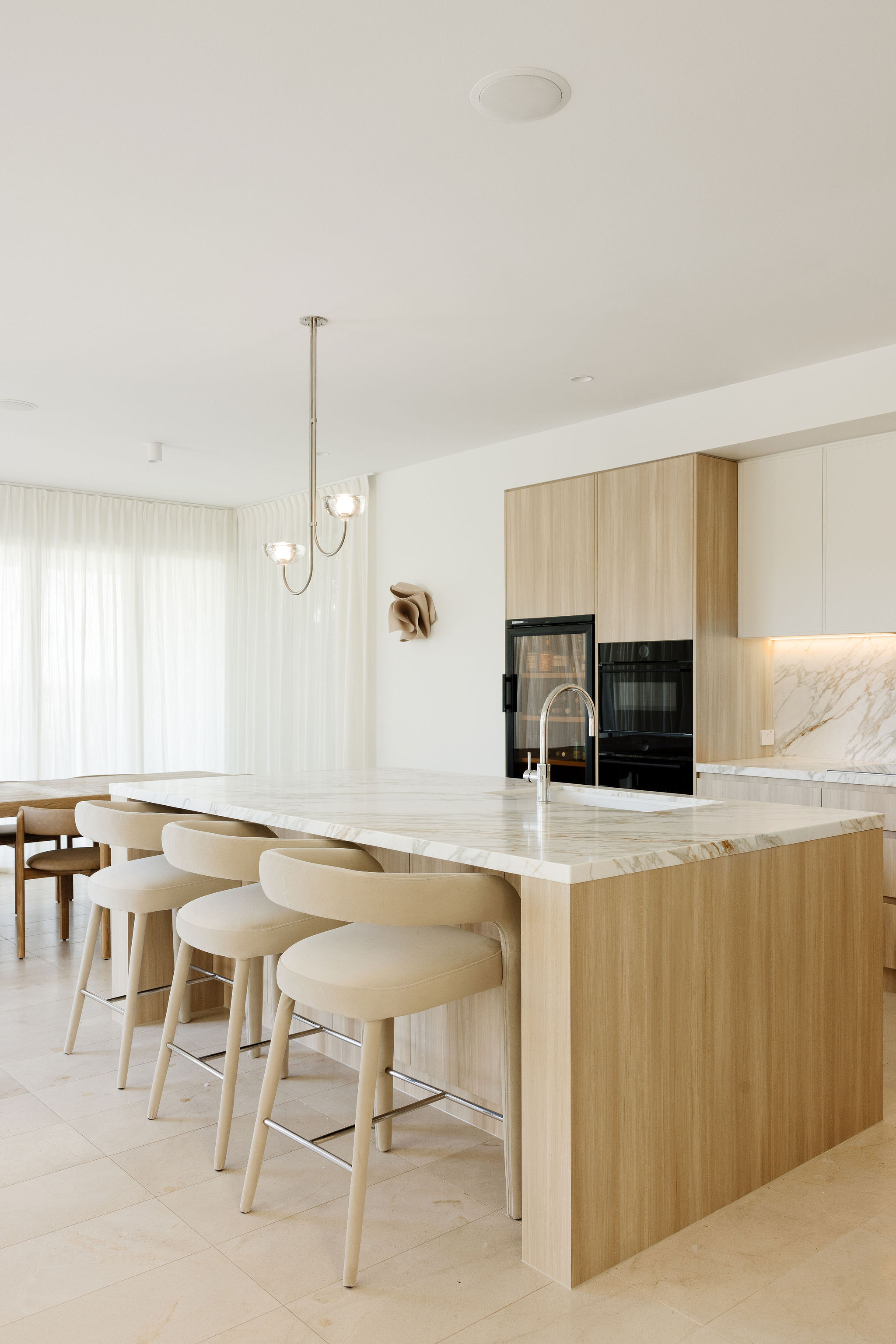 Custom timber joinery, kitchen, laundry and powder room renovation on Orient Drive, Sunrise Beach by Pearl Interiors, built with Nomad Builders, Franca Designs stone benchtops and Faucet Strommen tapware, Sunshine Coast