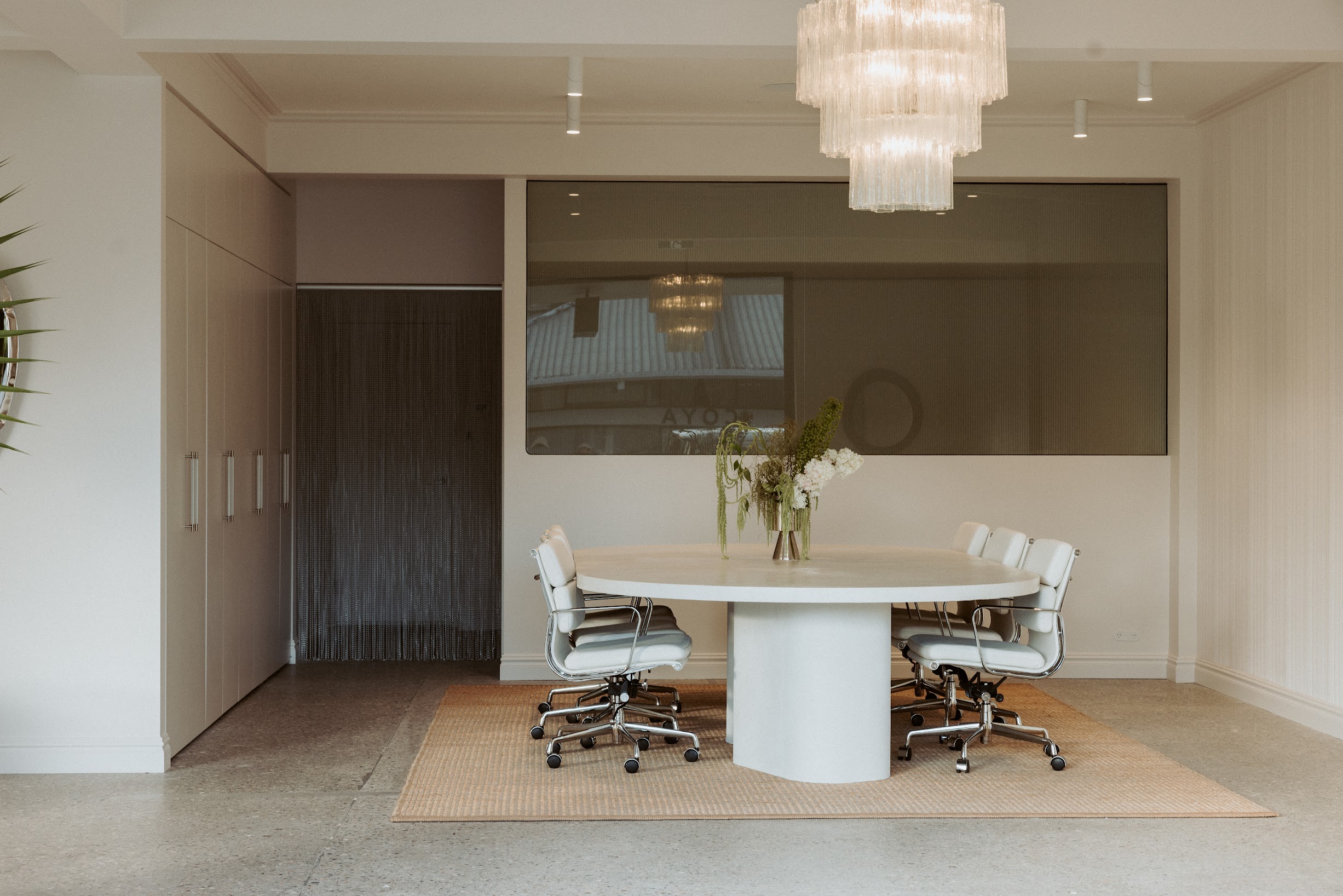 Design desk and workspace, Pearl Interiors flagship design studio in Noosa Heads, Sunshine Coast, natural stone, timber joinery and vintage lighting