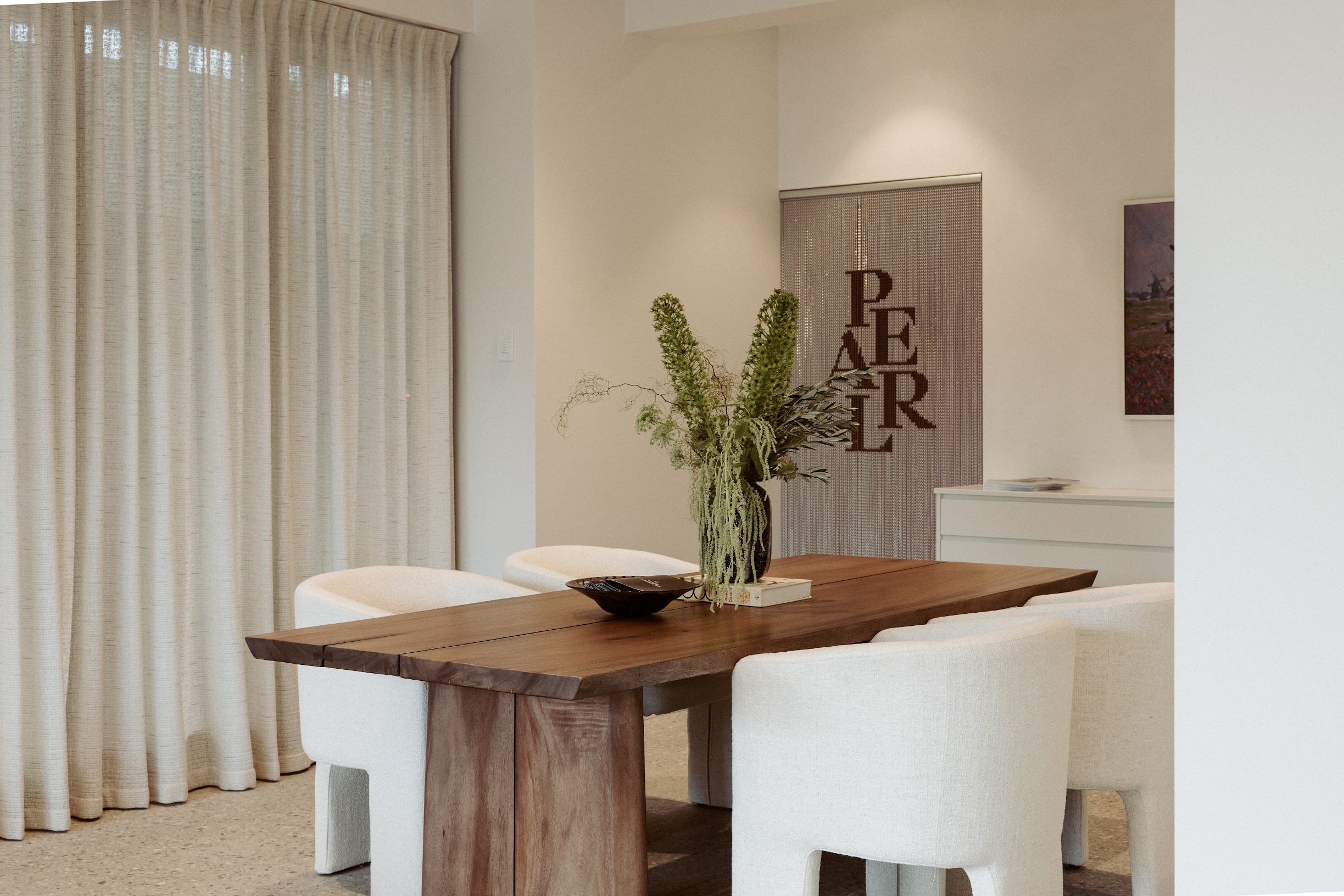 Bright studio interior, Pearl Interiors flagship design studio in Noosa Heads, Sunshine Coast, natural stone, timber joinery and vintage lighting