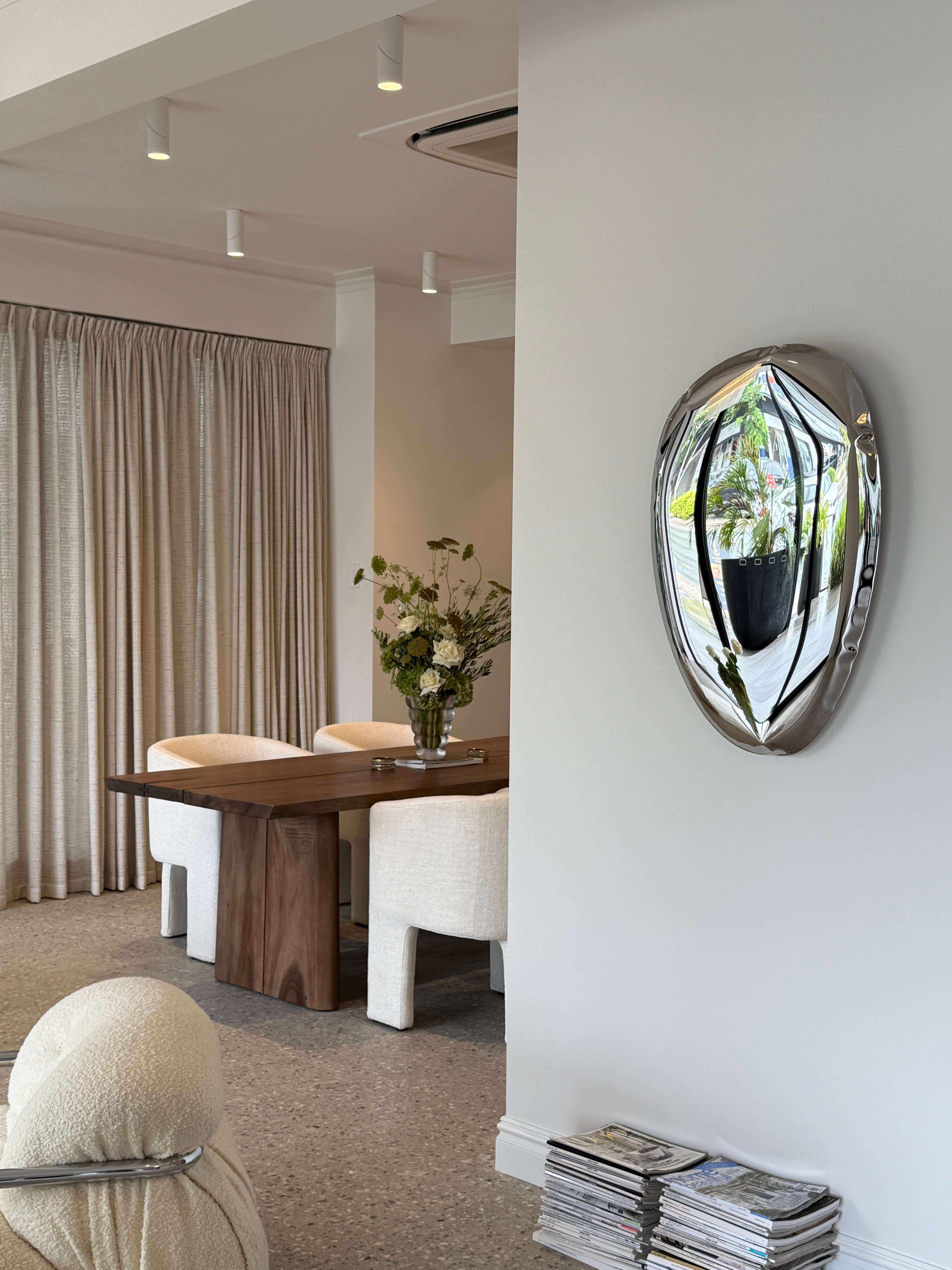 Layered materials display, Pearl Interiors flagship design studio in Noosa Heads, Sunshine Coast, natural stone, timber joinery and vintage lighting