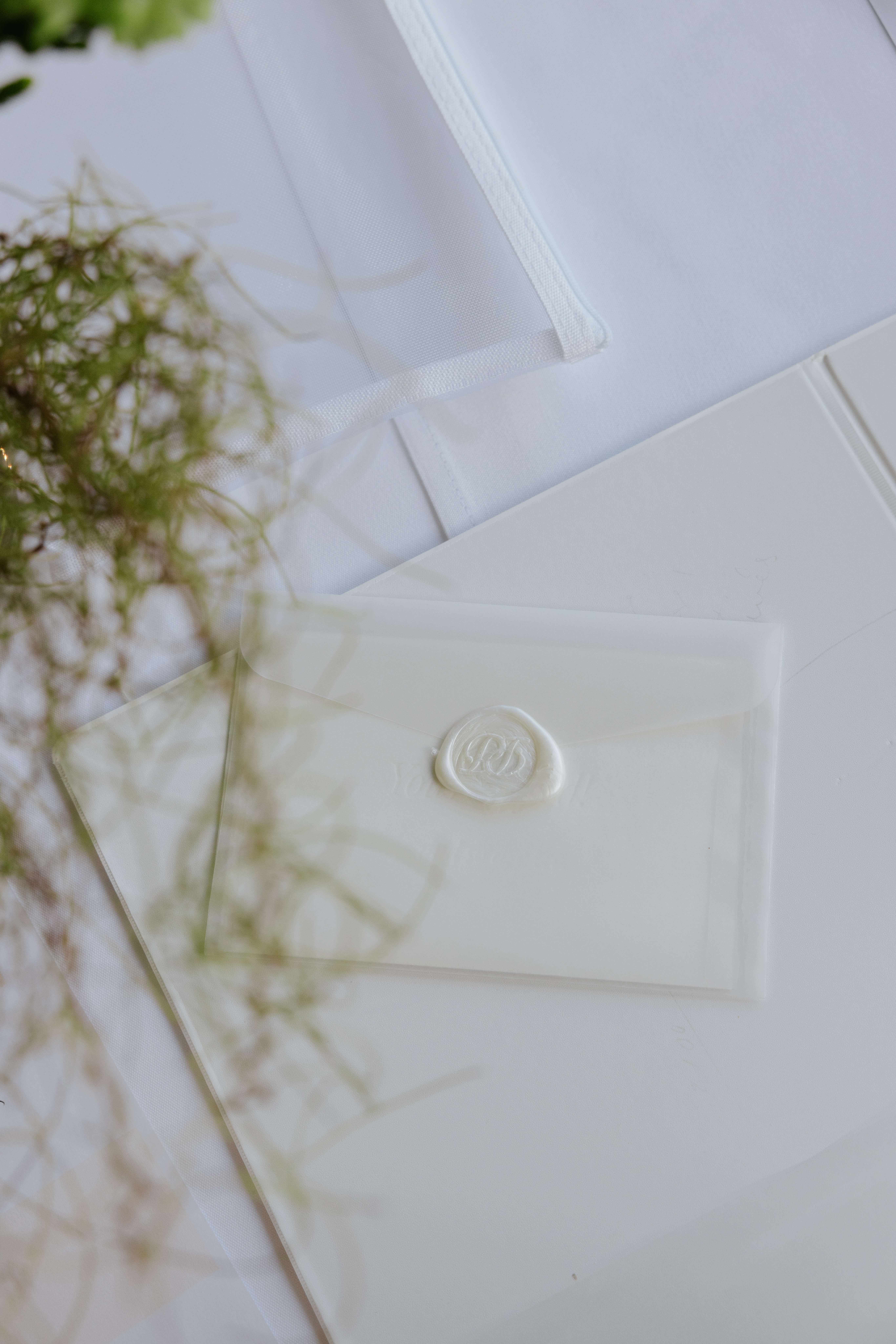 Working design studio, Pearl Interiors flagship design studio in Noosa Heads, Sunshine Coast, natural stone, timber joinery and vintage lighting