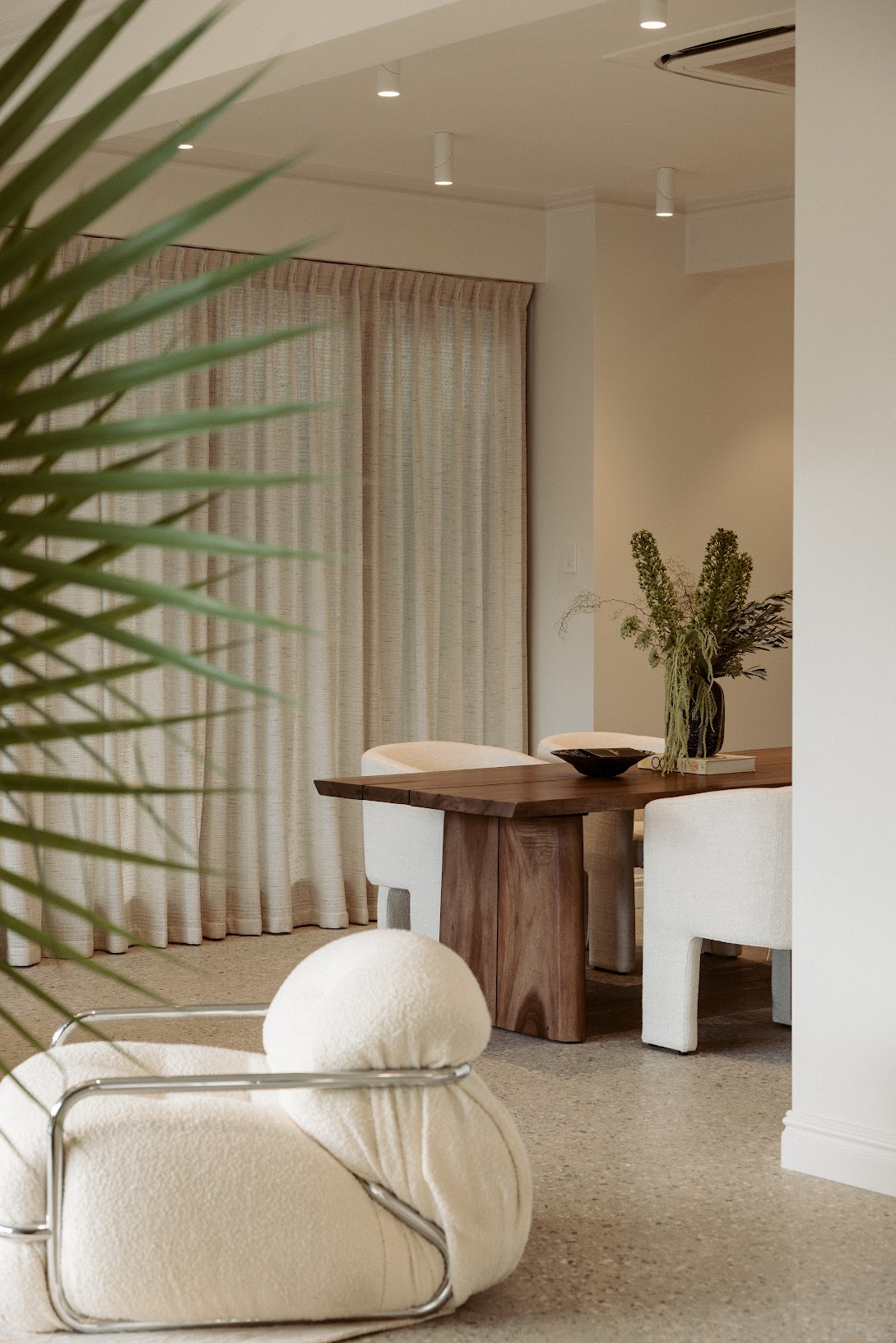 Stone and timber palette, Pearl Interiors flagship design studio in Noosa Heads, Sunshine Coast, natural stone, timber joinery and vintage lighting