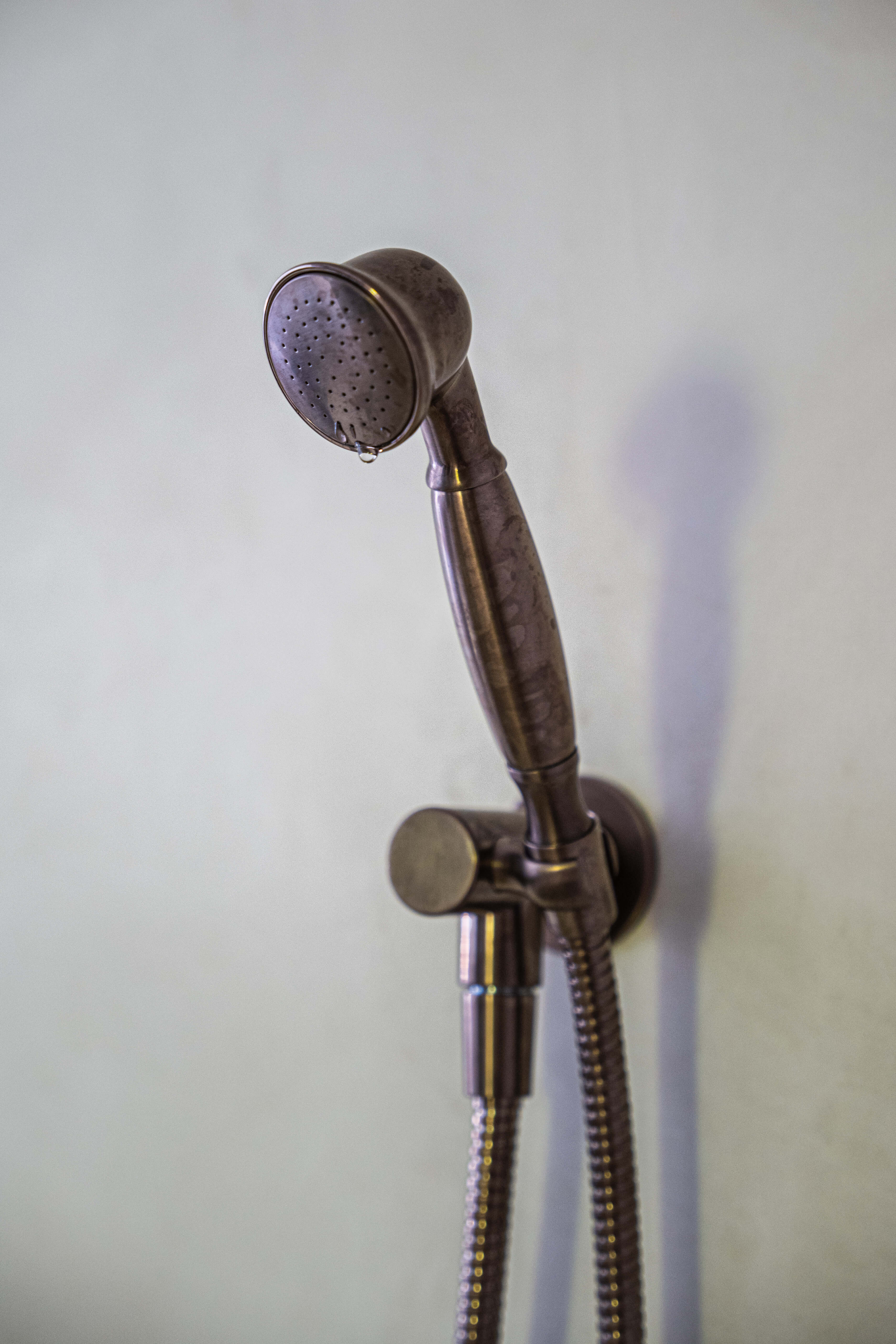 Walk-in shower, moody spa-inspired parents' bathroom renovation in Timbeerwah, Noosa Hinterland by Pearl Interiors, built with Squire Development Group, Ace Stone and Tile stone tiling and Faucet Strommen tapware