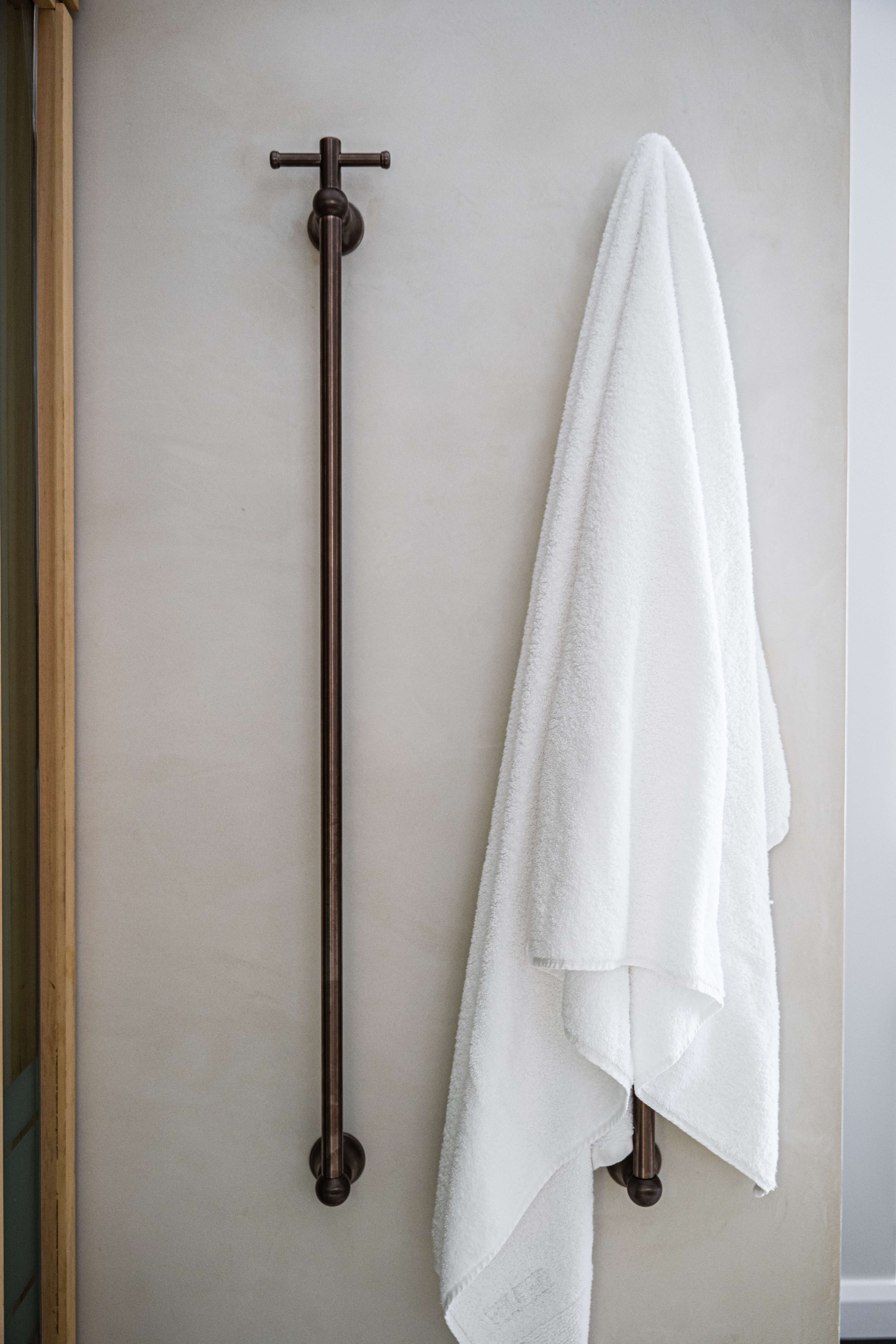 Dark, tactile palette, moody spa-inspired parents' bathroom renovation in Timbeerwah, Noosa Hinterland by Pearl Interiors, built with Squire Development Group, Ace Stone and Tile stone tiling and Faucet Strommen tapware