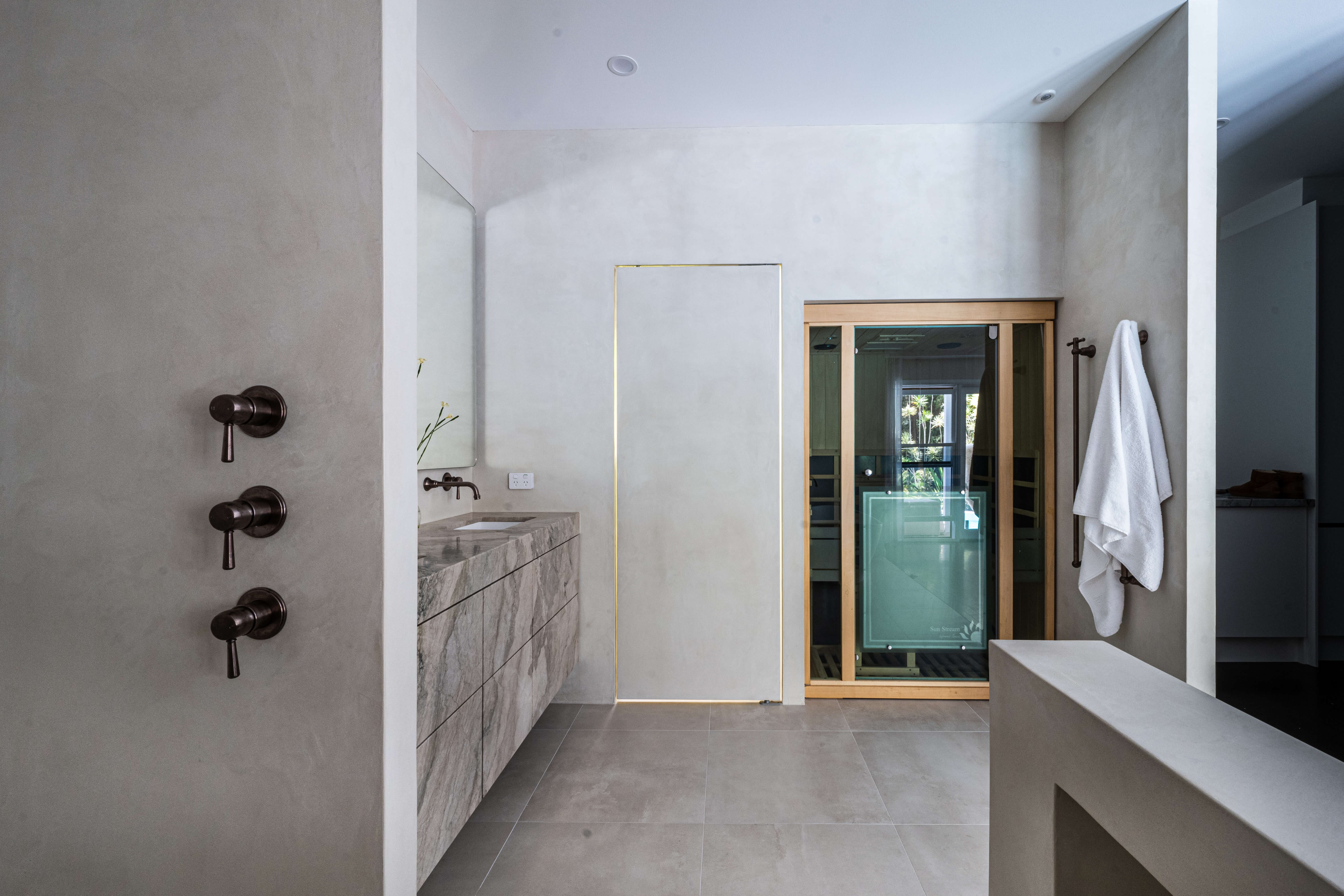 Private hinterland sanctuary, moody spa-inspired parents' bathroom renovation in Timbeerwah, Noosa Hinterland by Pearl Interiors, built with Squire Development Group, Ace Stone and Tile stone tiling and Faucet Strommen tapware