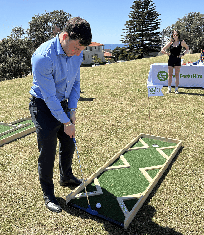 business man playing at Putt Party
