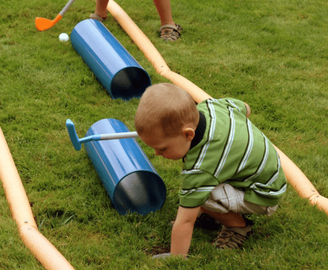 Child at mini golf