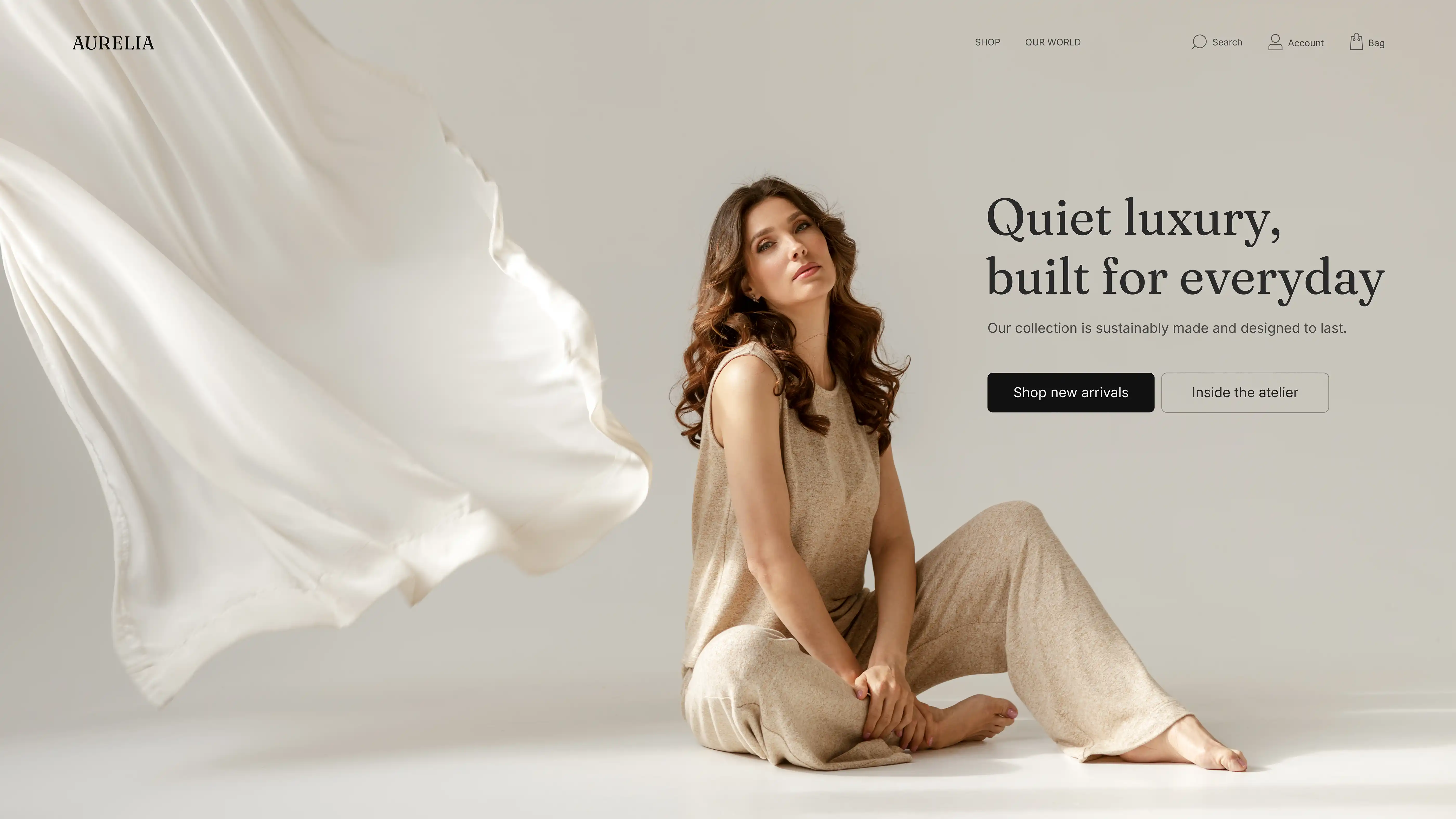 Aurelia luxury fashion website featuring a model in neutral clothing.