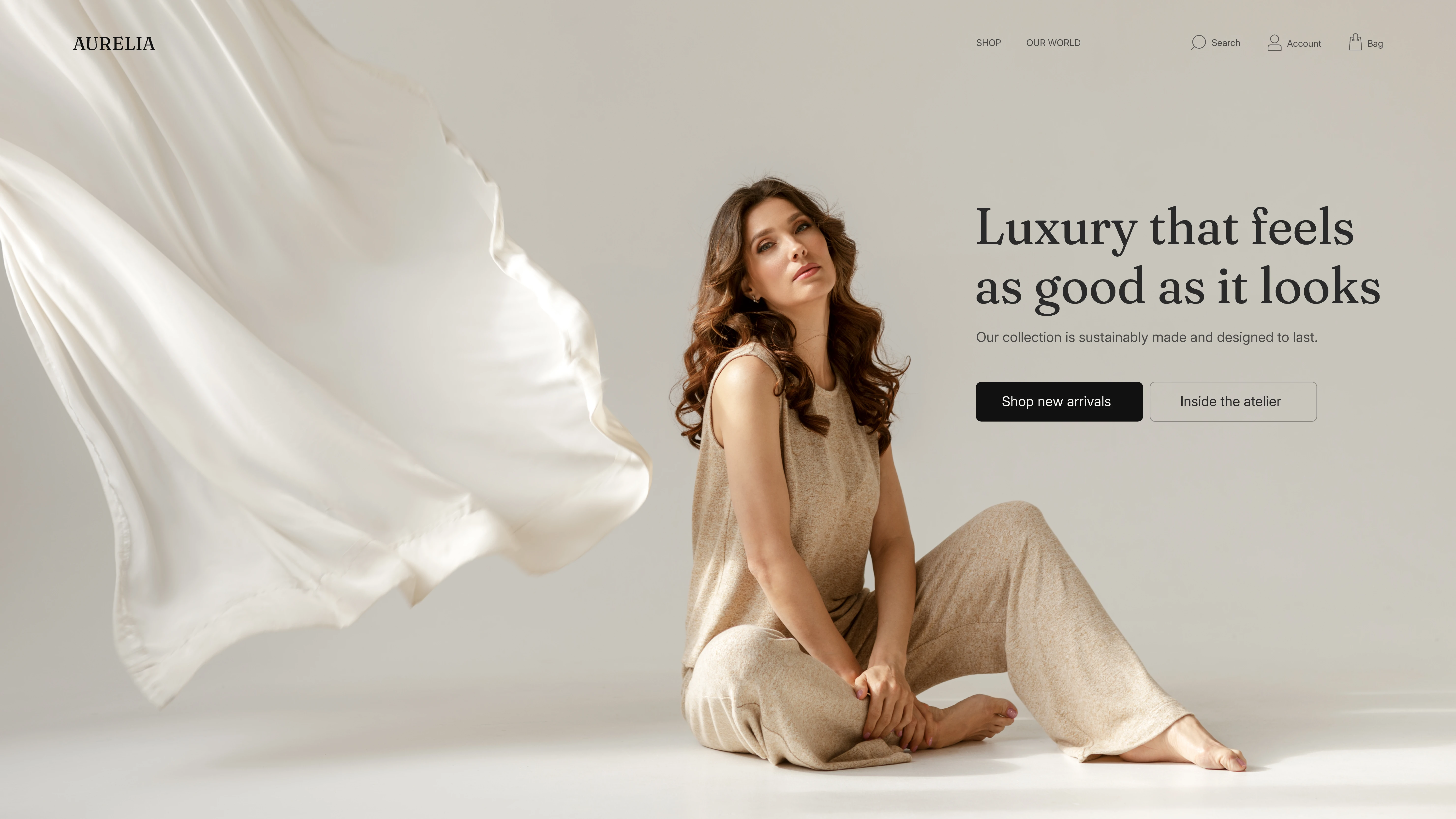Aurelia luxury fashion website featuring a model in neutral clothing.