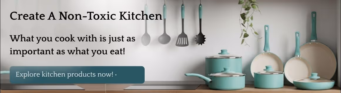 Minimalist kitchen with a collection of natural-looking pots and pans on a light wood countertop, with small potted plants on a shelf above.