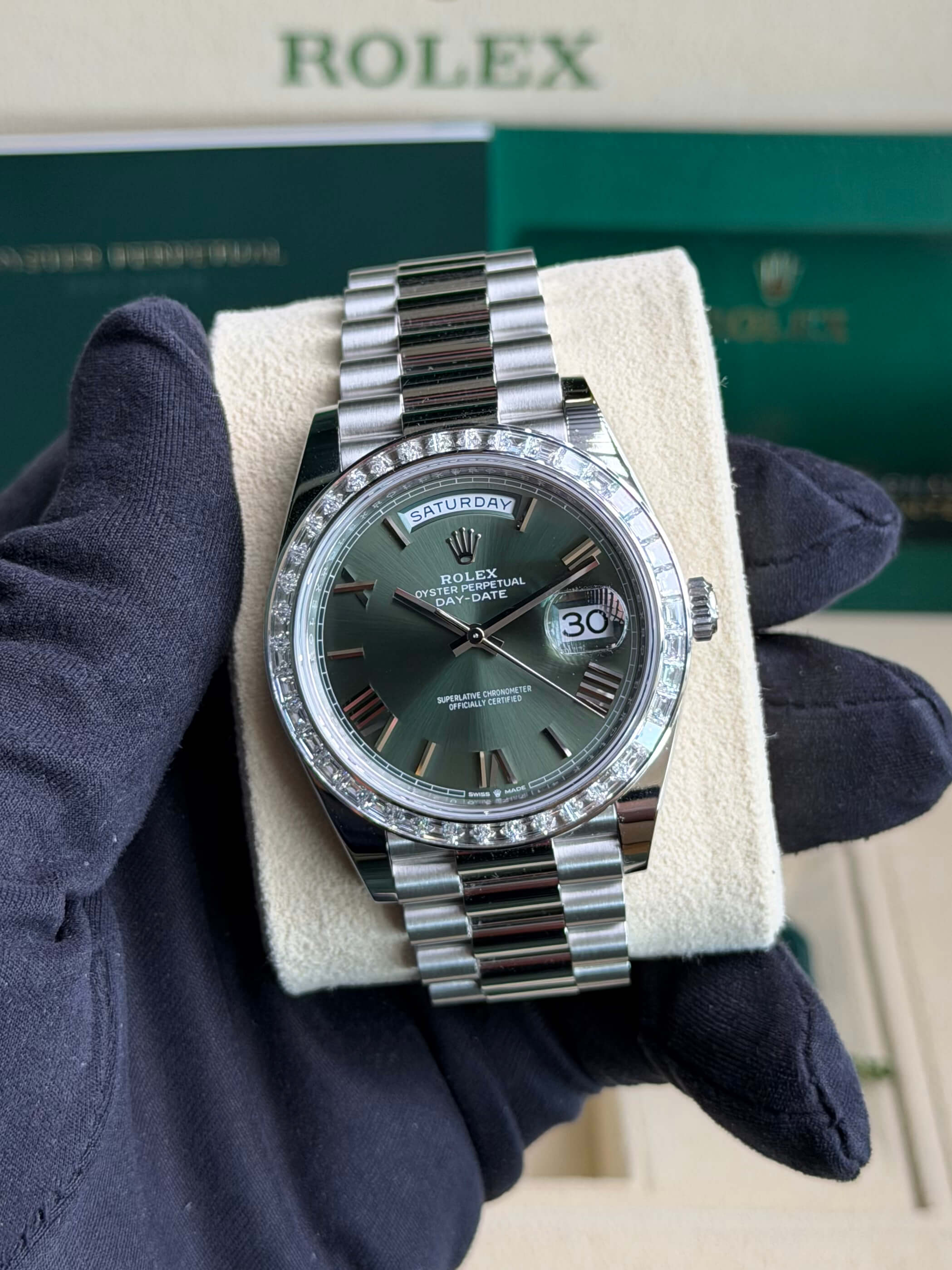Rolex 228396TBR-0020 Day-Date 40 Platinum Baguette / Green Roman 2023 Unpolished