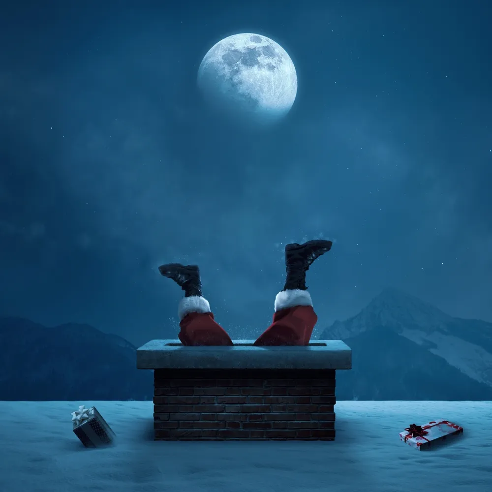 Chimney under full moon in Ann Arbor, MI – year-round chimney inspection and repair services