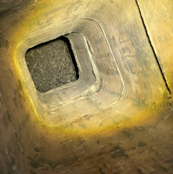 Chimney cleaning removing soot and buildup inside a residential chimney in Troy