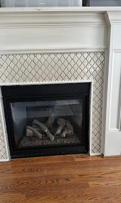 Fireplace insert installation inside an existing chimney system