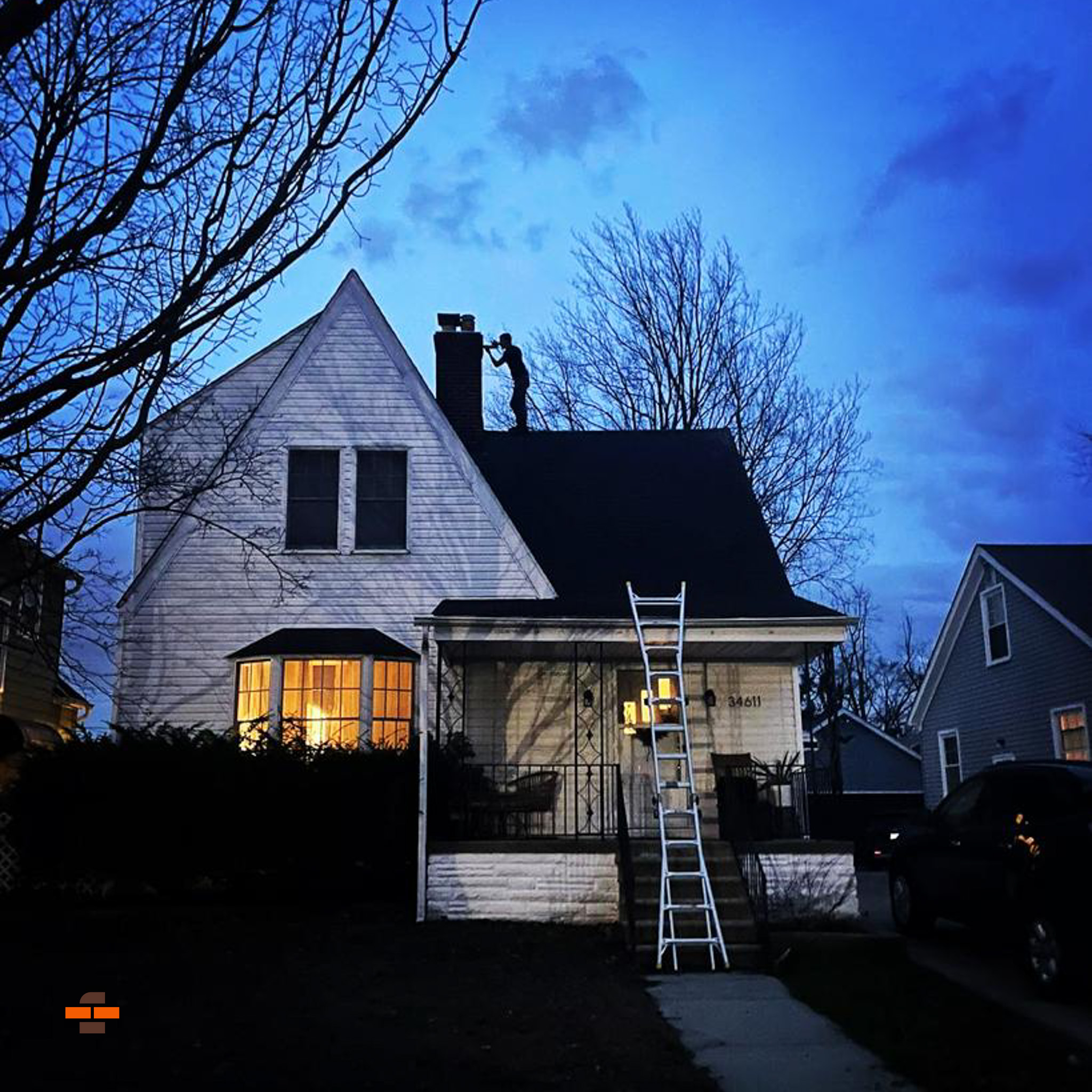 Professional chimney inspection performed on a residential home in Troy, MI