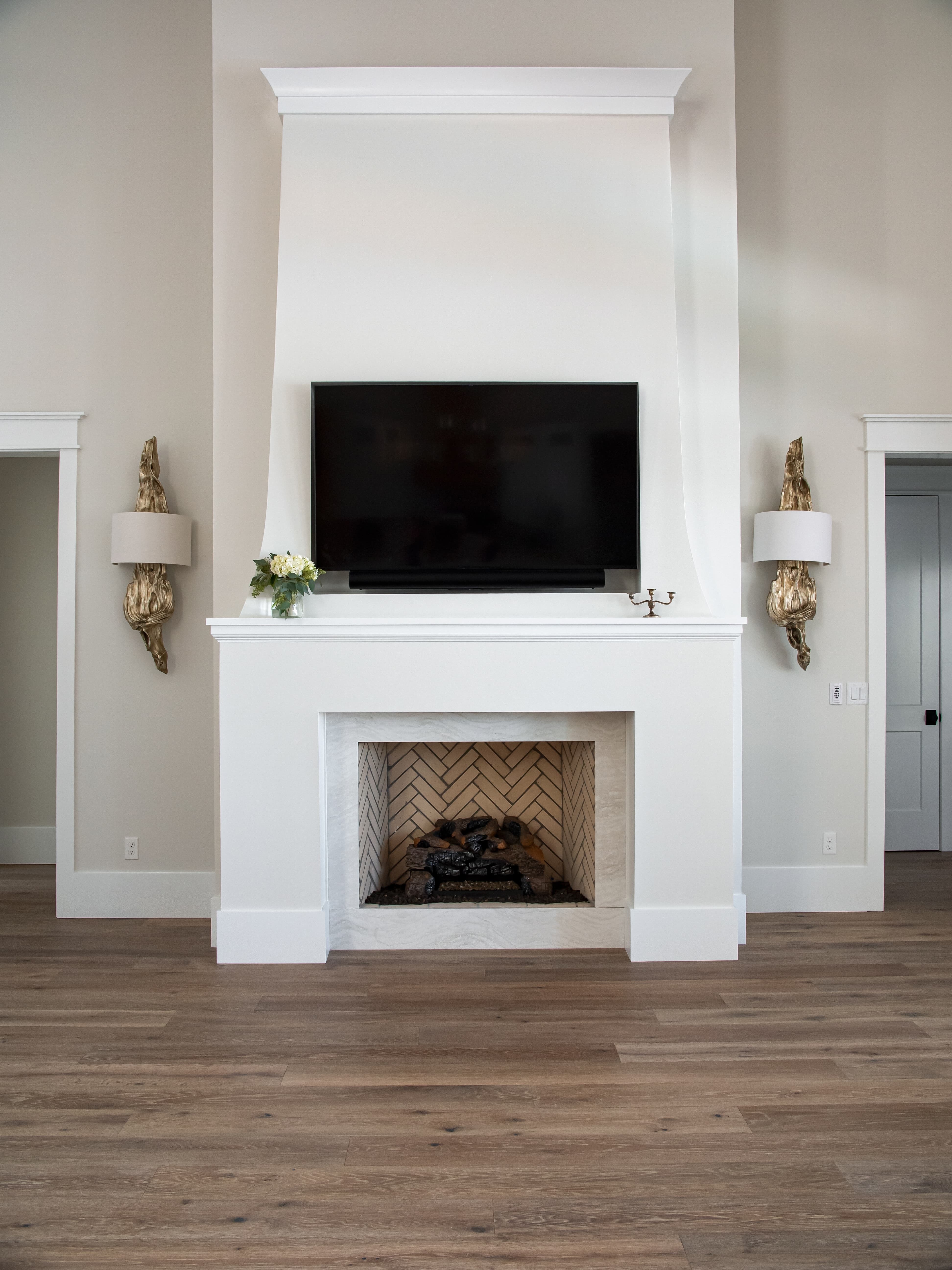 Contemporary gas fireplace installation with tiled surround