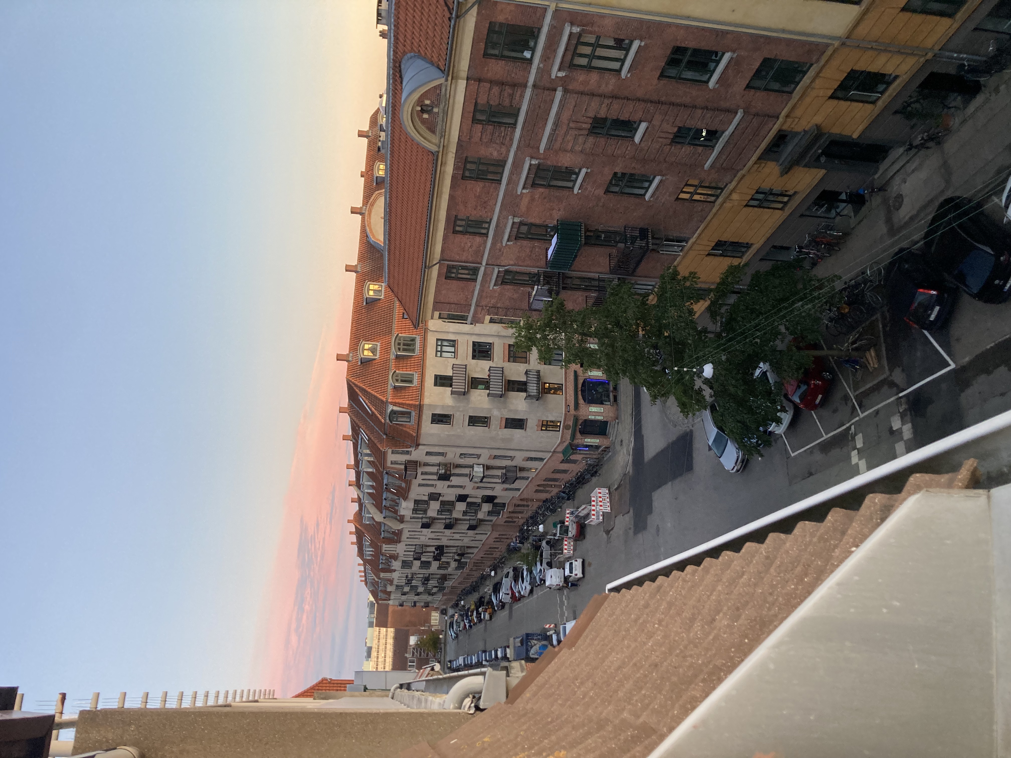 [background image] image of an inviting urban street near the restaurant