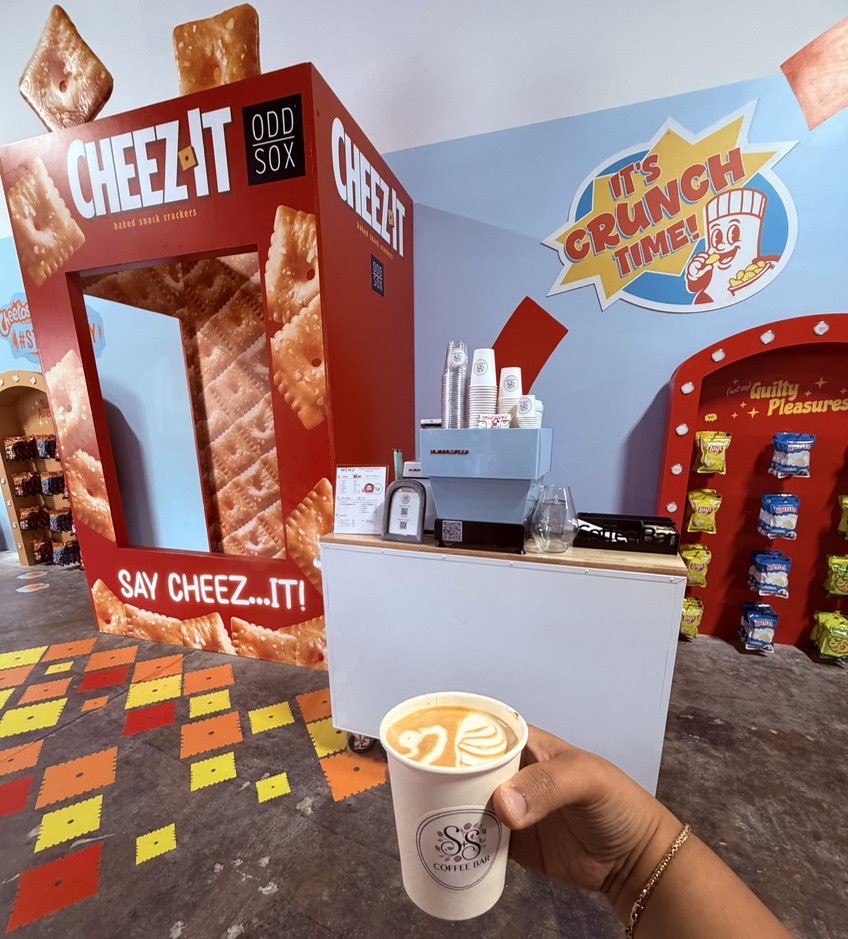 Coffee Cart and Mobile Espresso Bar in Wynwood, Miami with specialty latte in hand.