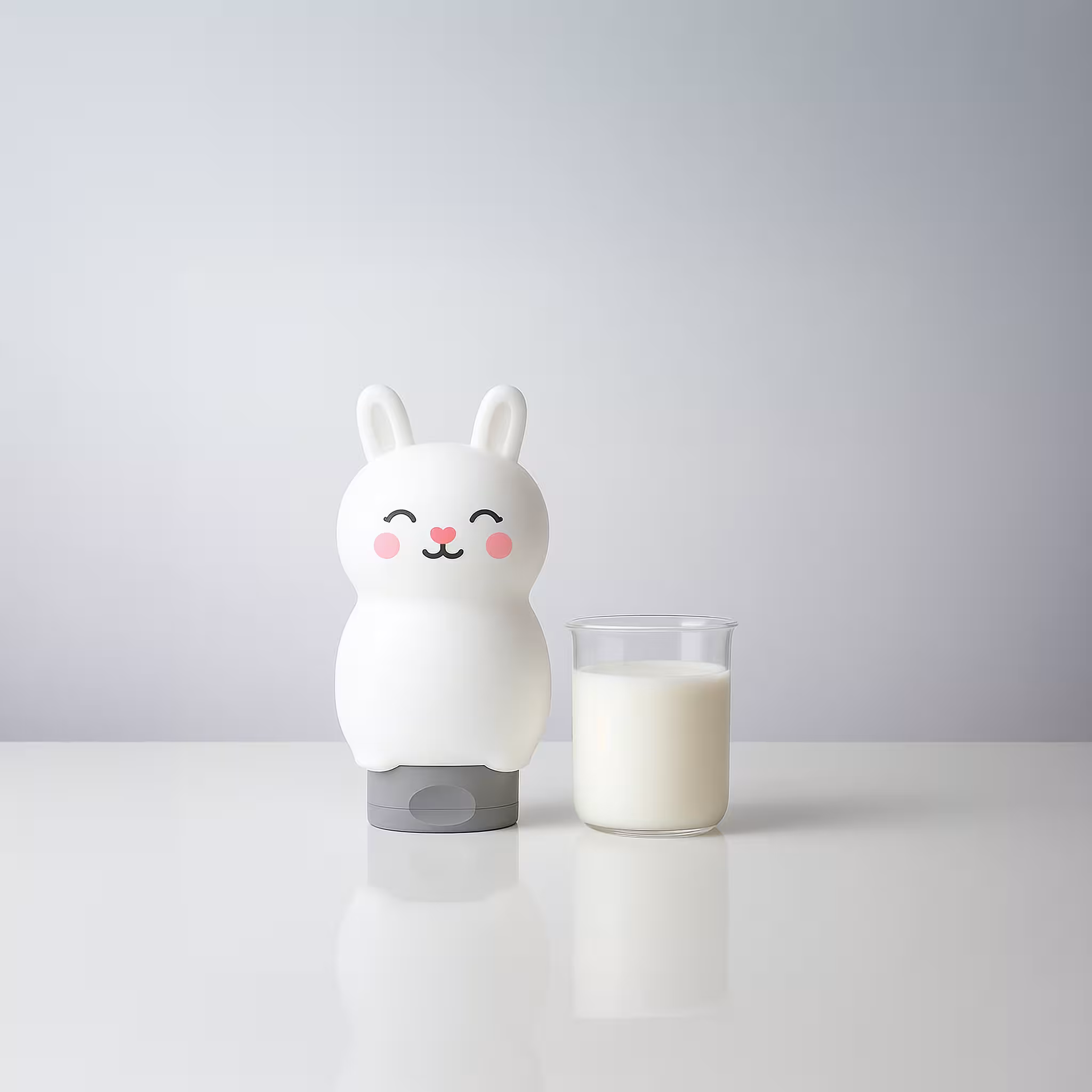 Milky Care bunny-shaped kids shampoo bottle beside a glass of milk on clean white background, soft daylight tone
