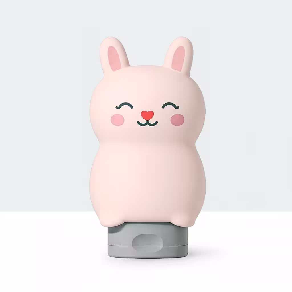 Milky Care pink bunny-shaped kids’ shampoo bottle with soft pastel tone, smooth silicone surface, and gentle rounded design symbolizing fun, safe, and tear-free bath time for children.
