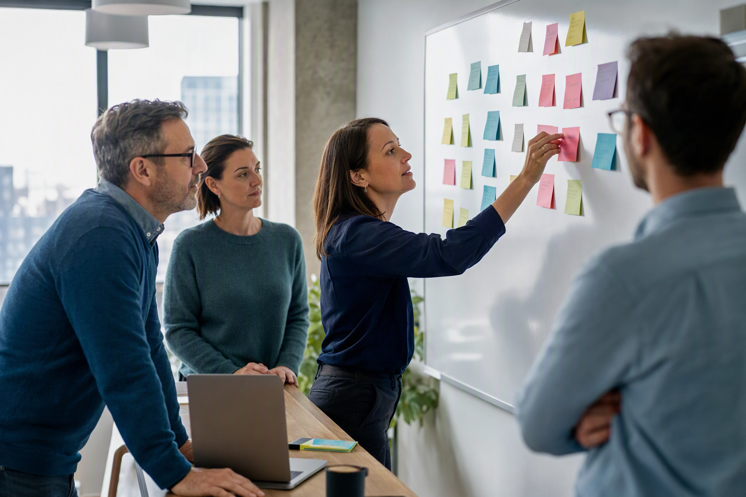 Working group prioritizing automation use cases on a whiteboard in a Quebec office