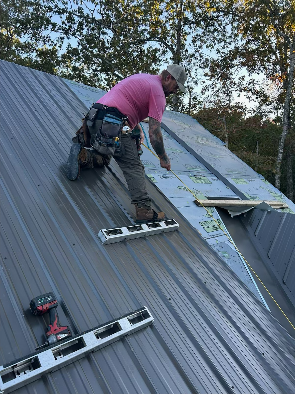 image of contractor on rooftop