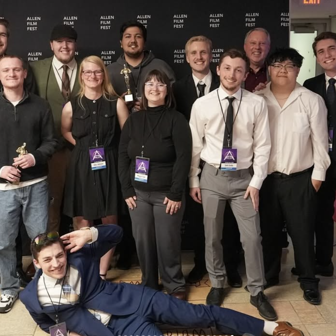 Film Co. members pose in front of backdrop at Allen Film Festival