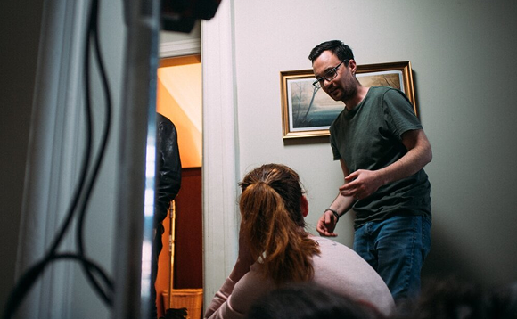 Photograph of Associate Professor Chris Fletcher working on film set