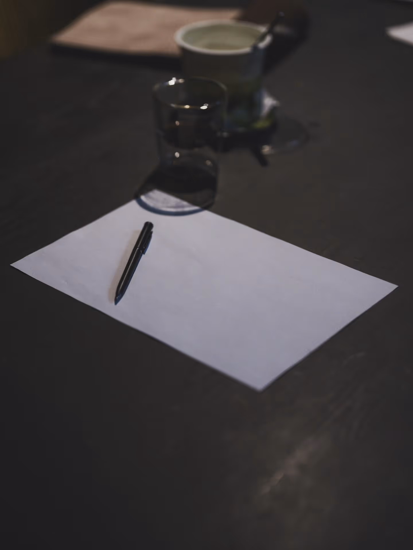 A legal style pen on top of an empty piece of paper