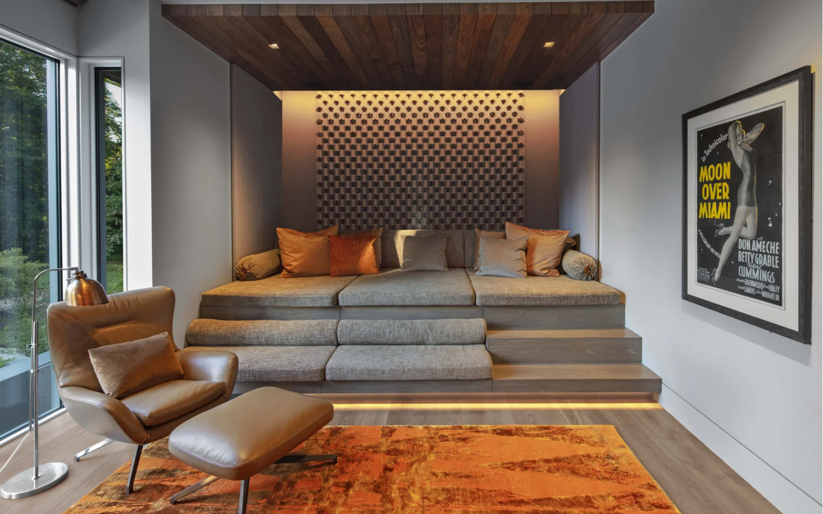 Cozy seating nook with built-in bench and accent lighting.