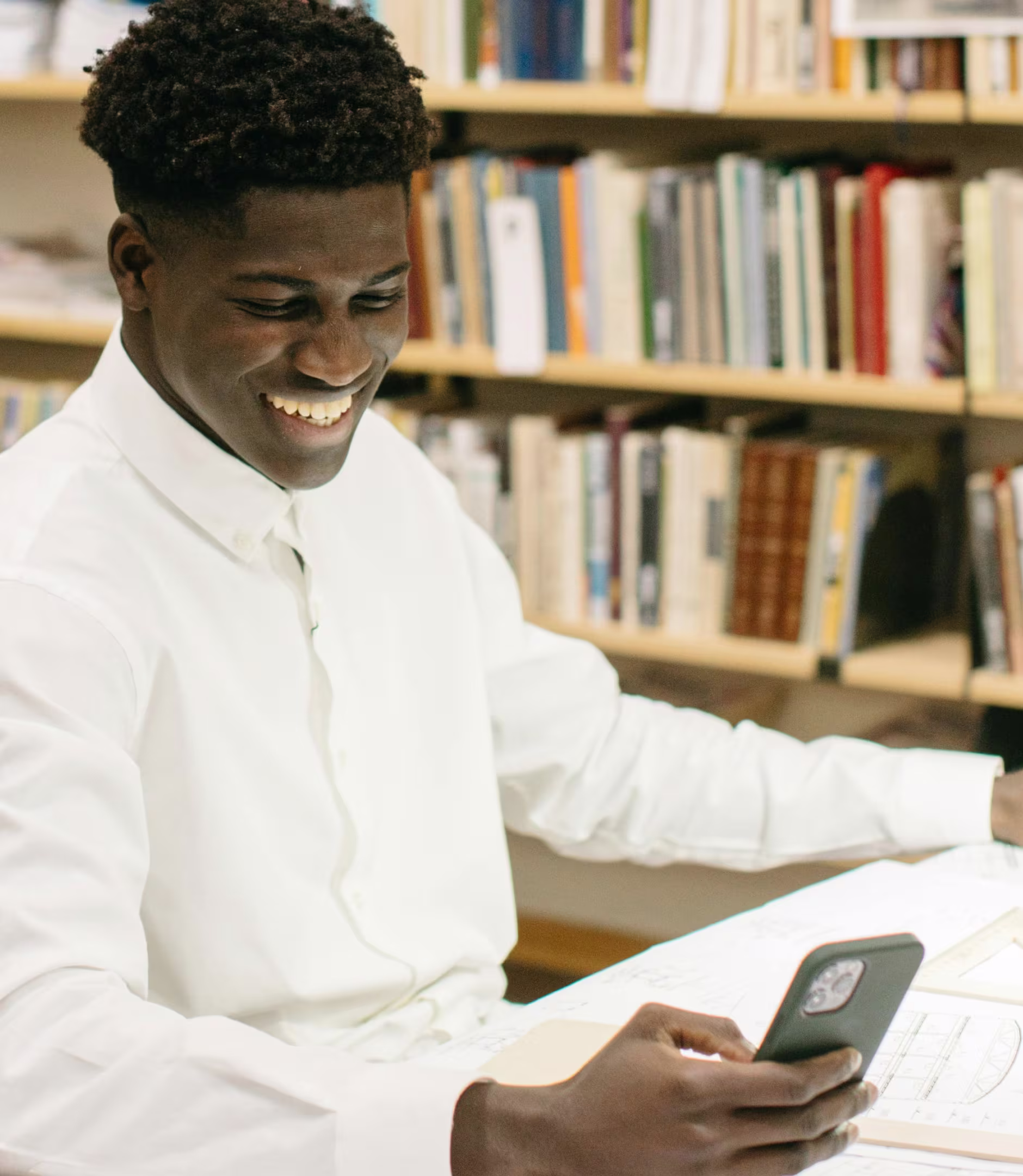 Photo of a man using his smartphone
