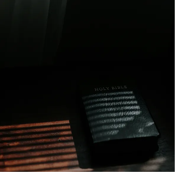 A book sitting on top of a wooden table.