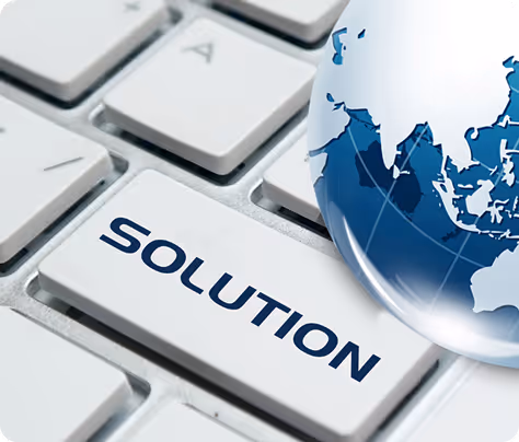 White computer keyboard with a key labeled SOLUTION and a translucent blue globe showing part of Asia.