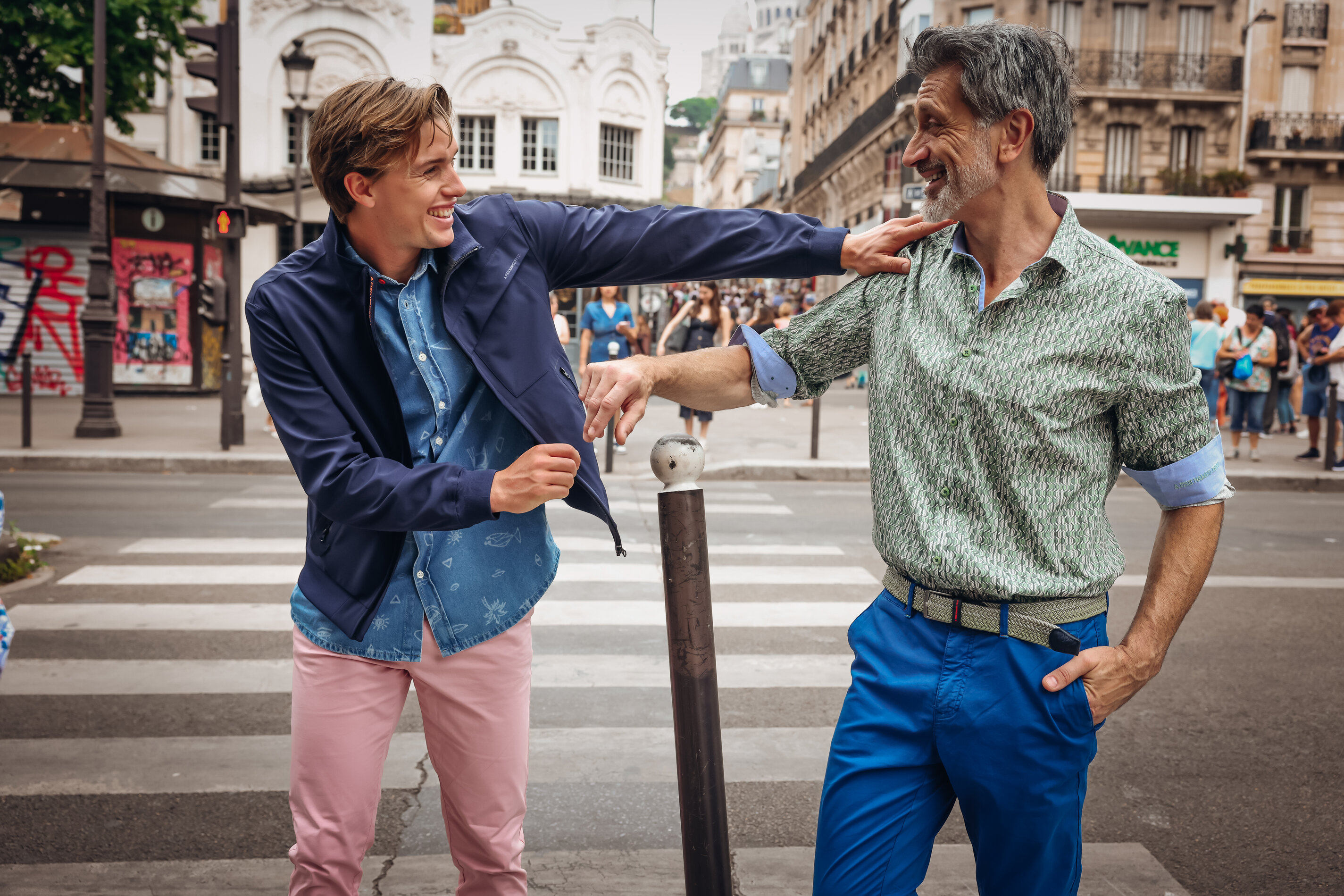 Young diverse couple having lunch with junk food