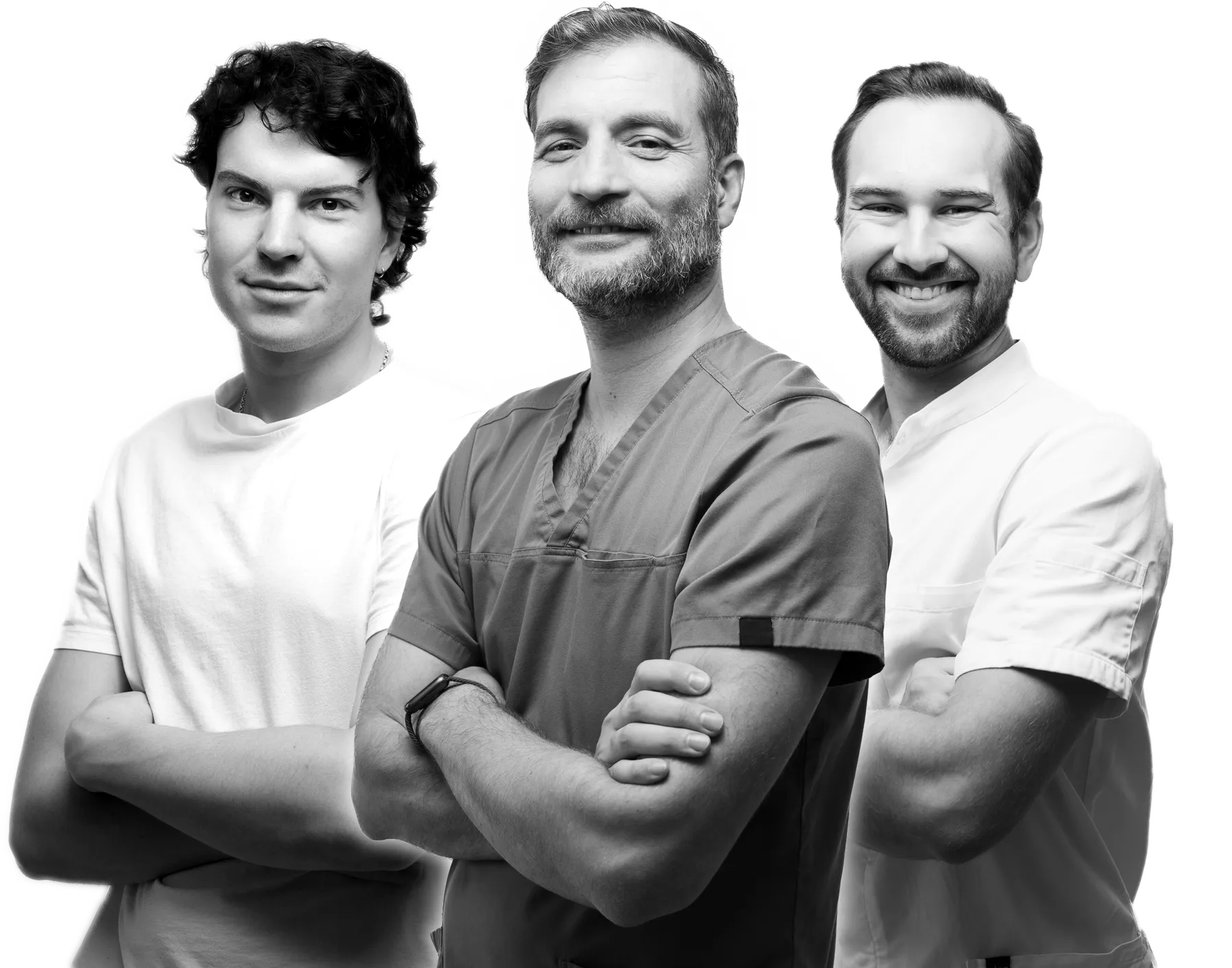 Three men standing side by side with arms crossed, one in medical scrubs, all smiling or neutral.