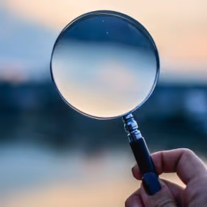 Blurry image of a skyline looking through a magnifying glass