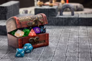 a box of dice for tabletop rpgs on a battlemap