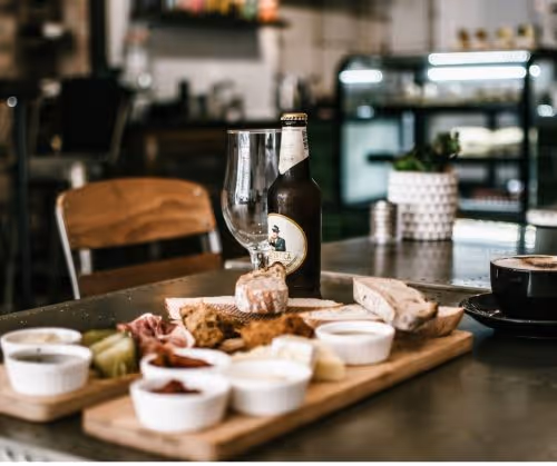 Collection of food to eat and drink on a wooden table