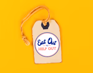 a price tag with the eat out to help out logo on it on a yellow background