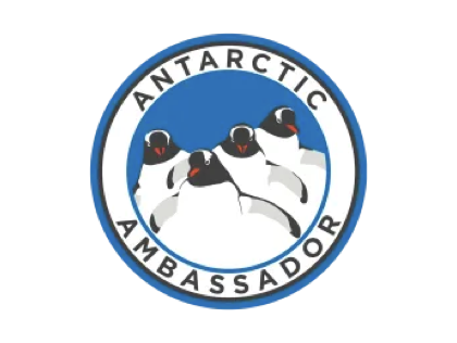 Logo with four penguins in a circle surrounded by the words Antarctic Ambassador.