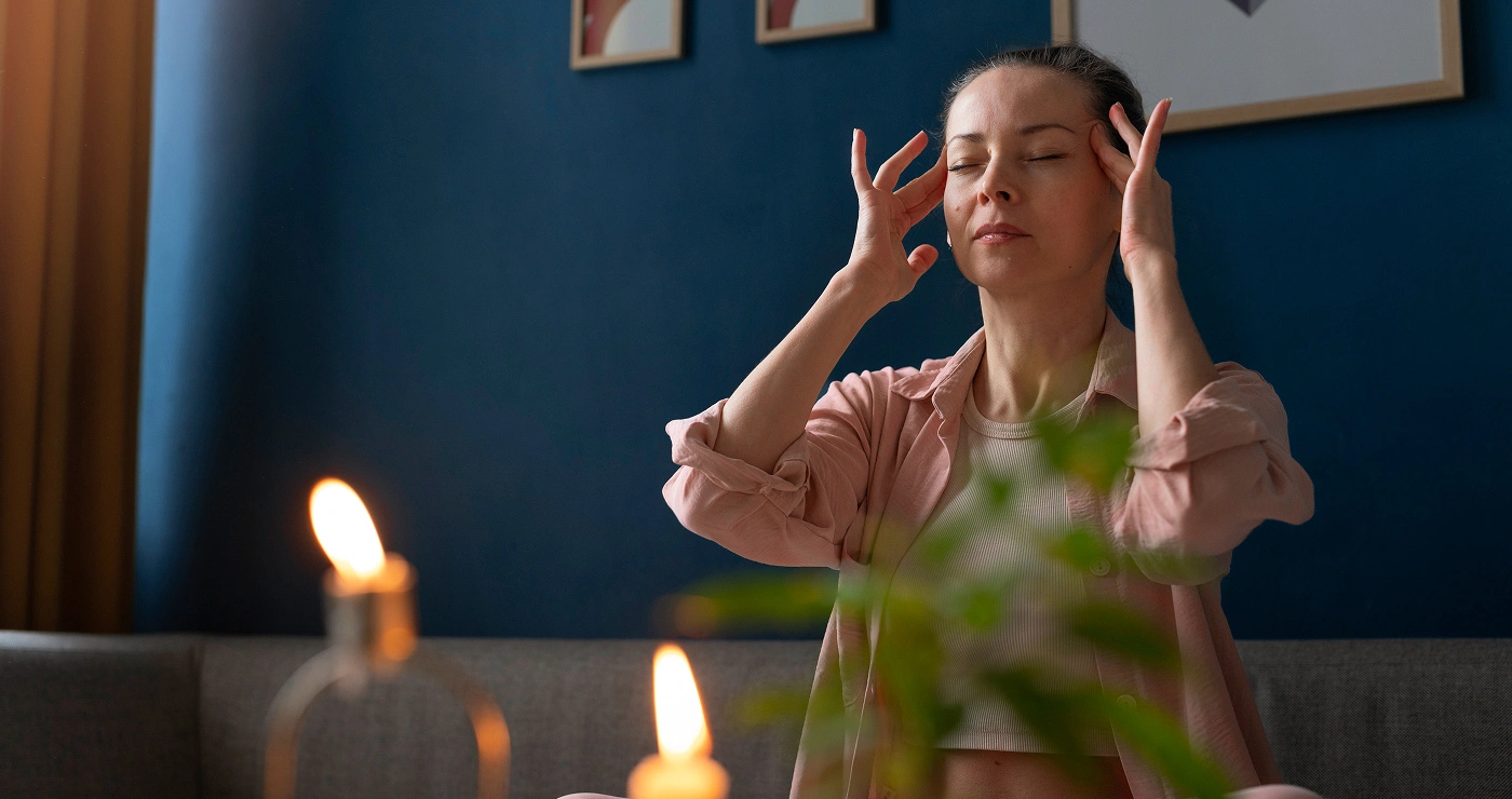 a woman with her hands on her head