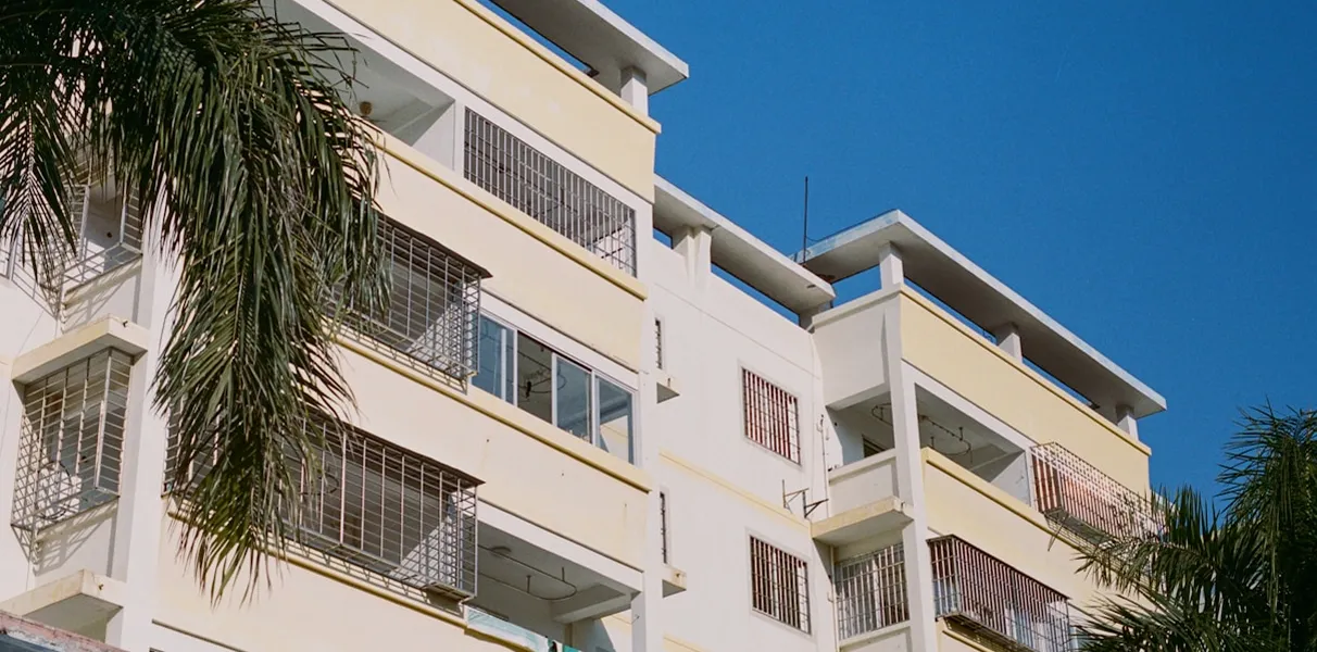 Apartment building with palm trees