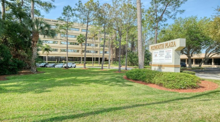 Plymouth Plaza office building and sign in Clearwater
