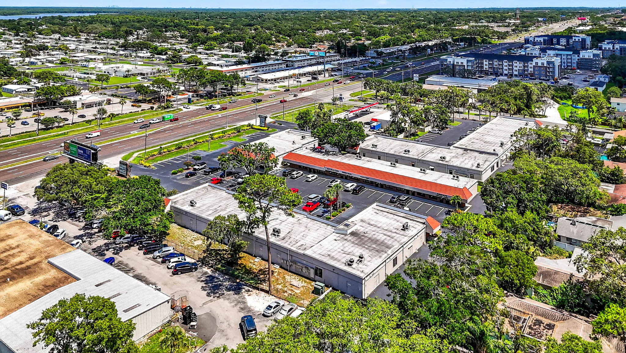 Palm Harbor Professional Center seen from above, single-story buildings with tile roofs around a parking court