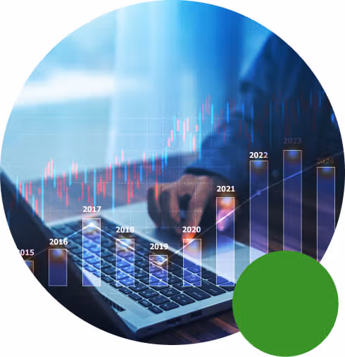 Financial data analysis with laptop and rising bar graphs showing yearly trends