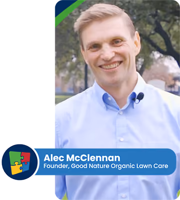 Smiling professional in blue shirt representing organic lawn care business
