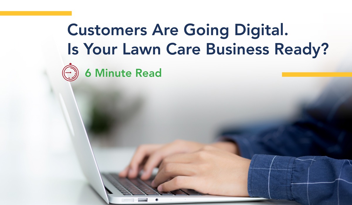 Hands typing on laptop, digital transformation for lawn care businesses