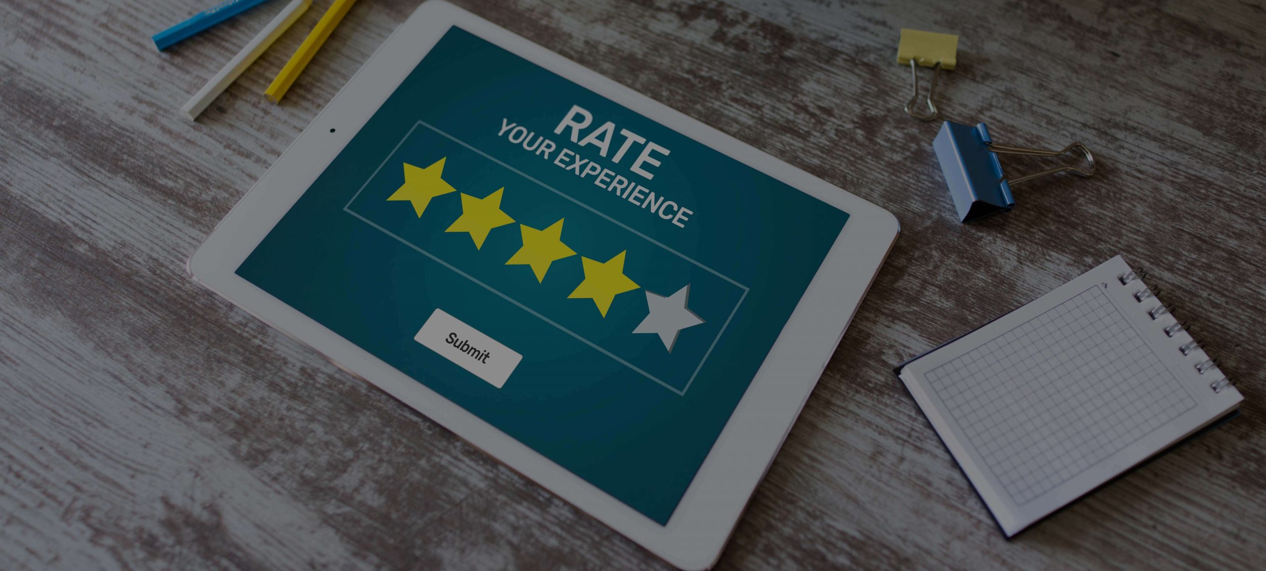 Tablet displaying customer rating screen with four yellow stars