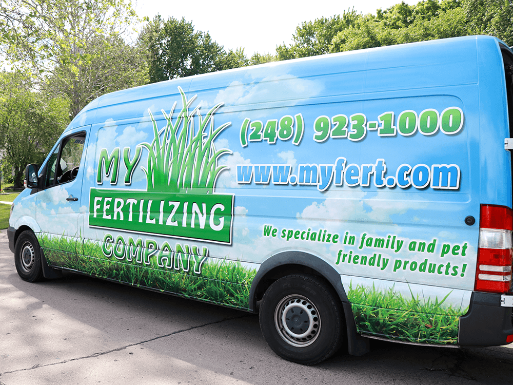 Blue van with My Fertilizing Company logo and contact information